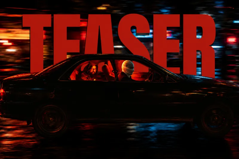 Ki Hoilo teaser key art: the car in motion under Dhaka night lights